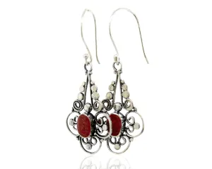 Oval Coral Dangle Earrings With A Flower Design