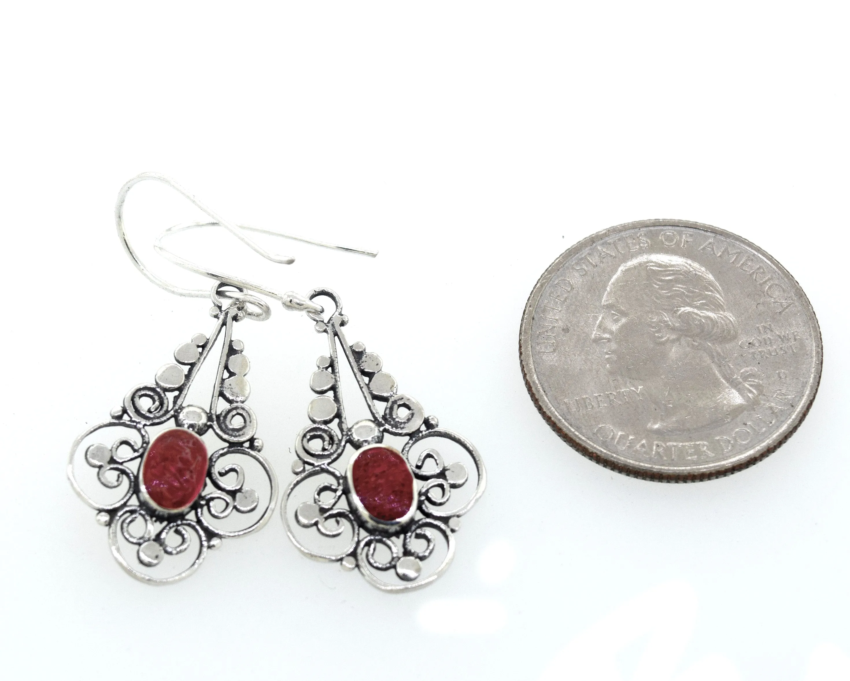 Oval Coral Dangle Earrings With A Flower Design
