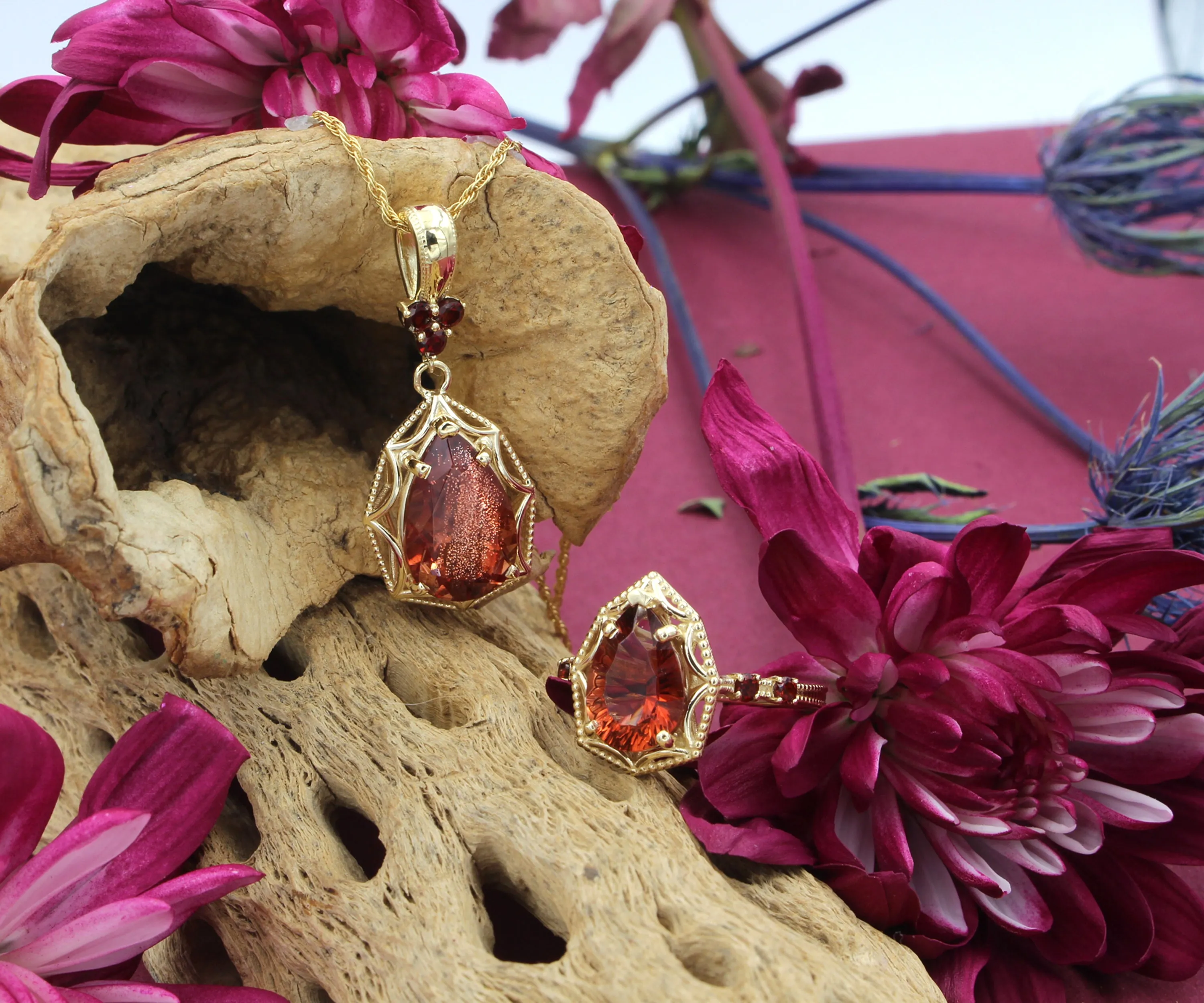 Starburst Teardrop Sunstone Garnet Gold Ring