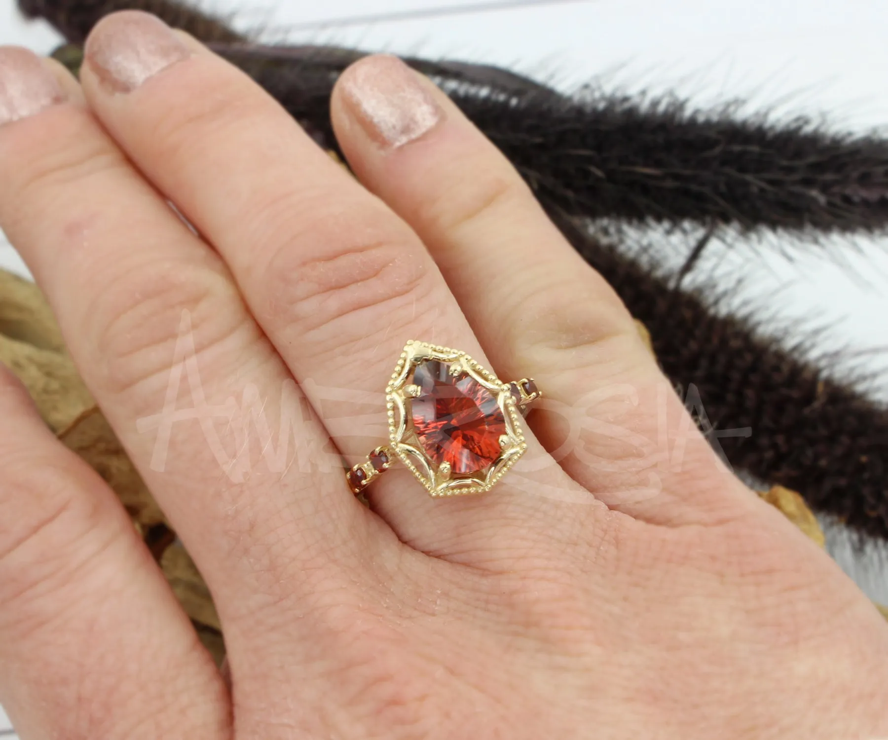 Starburst Teardrop Sunstone Garnet Gold Ring
